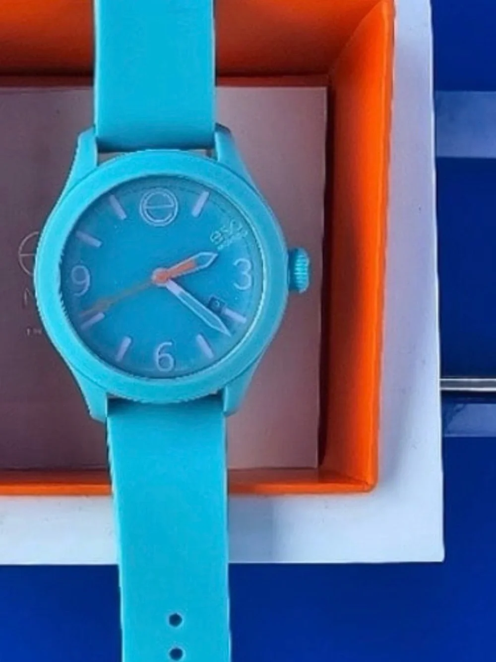 Movado ESQ Turquoise Silicone Ladies Watch with Orange Accent